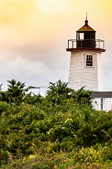 Wings Neck Light Tower as Sun Breakes Through Clouds